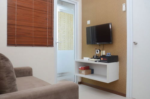 Photo 19 - Comfortable 2BR at Green Pramuka City Apartment Direct Access to Mall