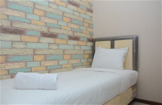 Foto 2 - Comfortable 2BR at Green Pramuka City Apartment Direct Access to Mall