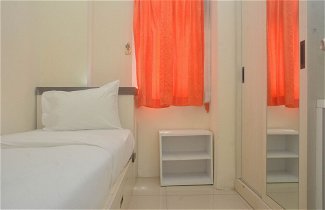 Photo 1 - Comfy And Best Deal 2Br At Green Pramuka City Apartment