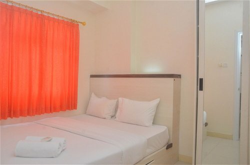 Photo 2 - Comfy And Best Deal 2Br At Green Pramuka City Apartment