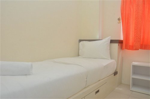 Photo 3 - Comfy And Best Deal 2Br At Green Pramuka City Apartment