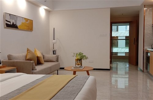 Foto 5 - Bainianhui International Apartment
