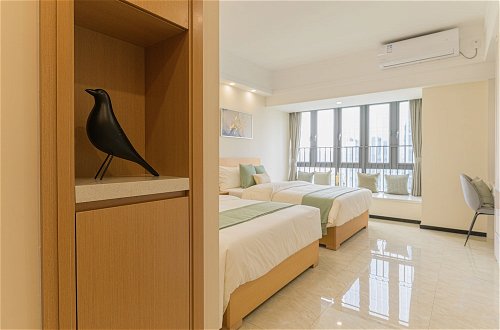 Foto 19 - Bainianhui International Apartment
