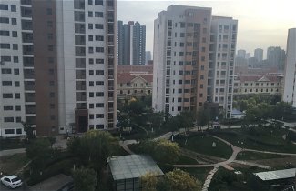 Foto 1 - Tianjin Yicheng Haoting Hotel Apartment