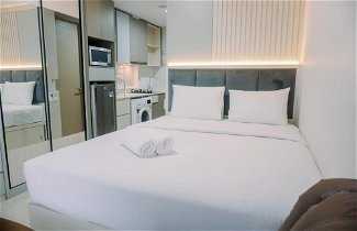 Foto 1 - Homey And Warm Studio At 28Th Floor Gold Coast Apartment