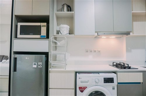 Foto 10 - Homey And Warm Studio At 28Th Floor Gold Coast Apartment