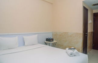 Photo 2 - Minimalist And Comfy Studio At Grand Dhika City Apartment
