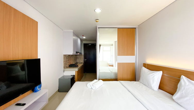 Photo 1 - Nice And Comfy Studio At Enviro Apartment