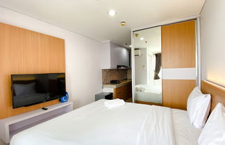 Photo 2 - Nice And Comfy Studio At Enviro Apartment