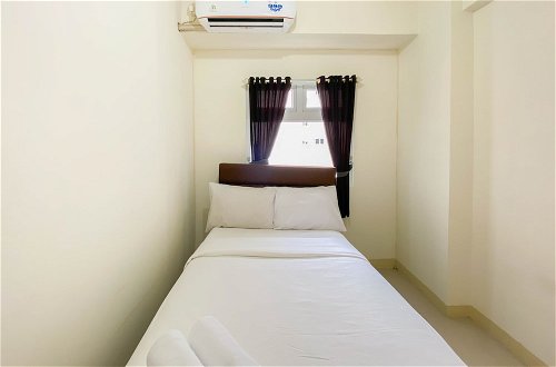 Photo 10 - Good Choice And Homey 2Br At Green Pramuka City Apartment