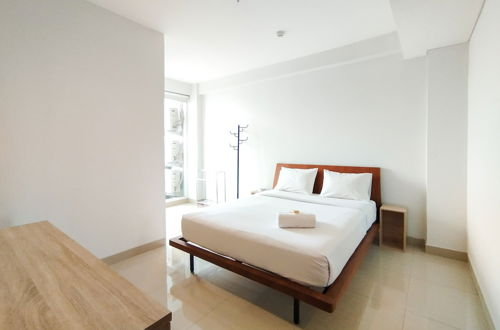 Photo 3 - Tranquil Designed 2Br Apartment Dago Suites