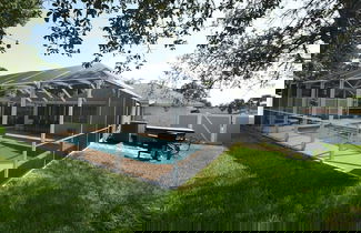 Foto 3 - Hidden Oasis Spacious Home With Salt Water Heated Pool Hot Tub Fenced Yard Pets are Welcome