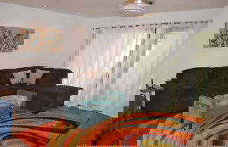 Photo 3 - 2BD Ground Floor Condo in Gated Gardens Pool Spa