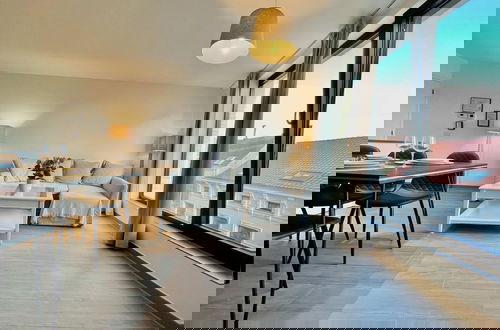 Photo 3 - Modern 2BR 1.5 BA Near Diamond District by Oneluxstay