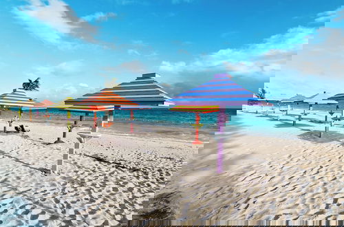 Photo 49 - NEW Stunning Beachfront Condo at the Coral Beach