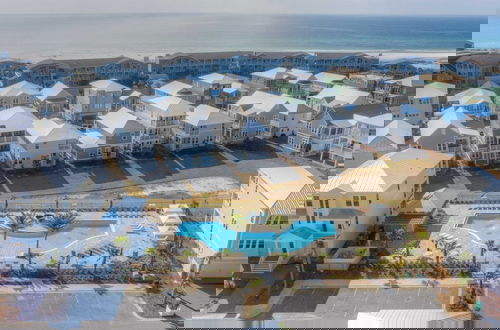 Photo 4 - Coconut Cove by Avantstay Deck w/ Hot Tub, Access to 2 Pools