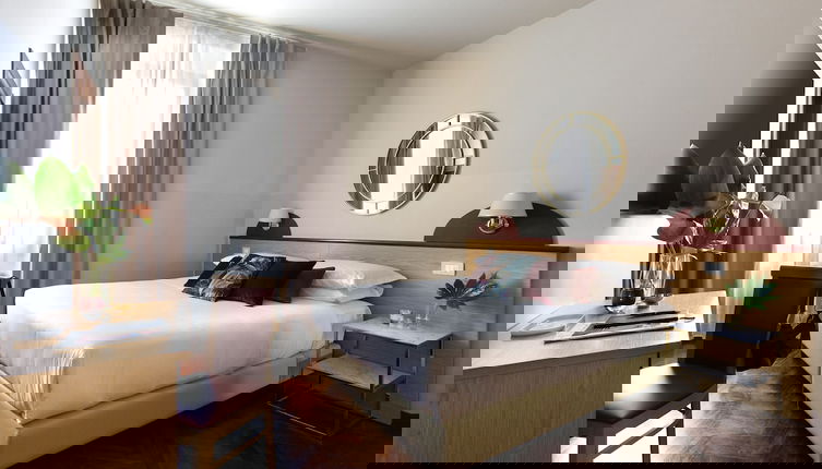 Foto 1 - Aramis Rooms