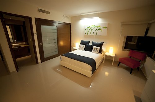Foto 13 - Bahia Principe Vacation Rentals - Three-Bedroom House