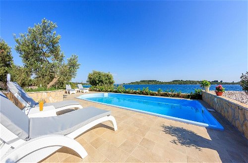 Photo 24 - Beachfront Luxury Villa w. Pool & Large Garden