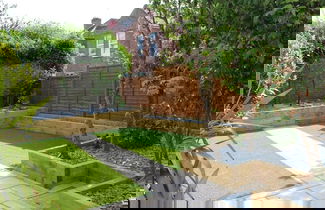 Photo 2 - Orchard Garden Apartment