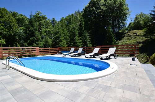 Photo 15 - Adorable Home With Pool & Hot Tub Surrounded by Beautiful Nature