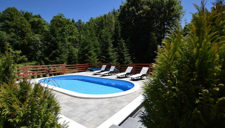 Photo 1 - Adorable Home With Pool & Hot Tub Surrounded by Beautiful Nature