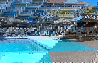 Photo 2 - Easy Beach Access Charming Beachside Condo
