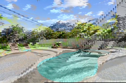 Photo 34 - Sardinia Vacation Rental: Delightful Coastal Home near Vanderbilt Beach. Relax in a Private Pool and Spacious 4-BR Retreat with Modern Amenities. Ideal for Families. Minutes from Mercato and Local Attractions