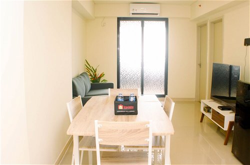 Photo 9 - Comfort And Well Design 2Br With Working Room At Meikarta Apartment