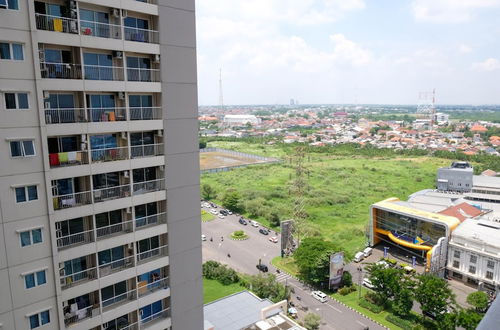 Photo 15 - Homey And Comfy Studio At Puncak Bukit Golf Surabaya Apartment