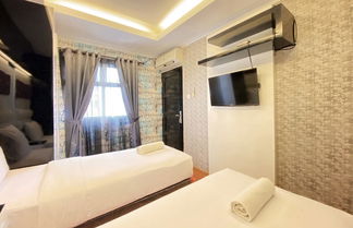 Photo 1 - Spacious 2Br At Suites @Metro Apartment