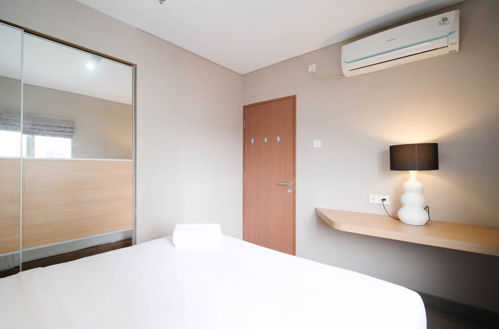 Foto 4 - Minimalist And Beautiful 1Br With Extra Room At Pavilion Permata Apartment
