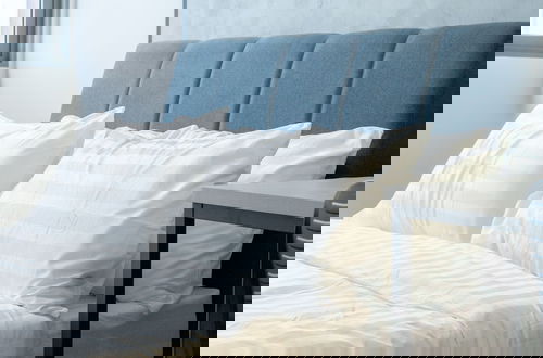 Foto 4 - Riveria City by Plush