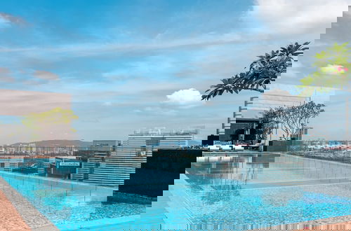 Foto 1 - Riveria City by Plush