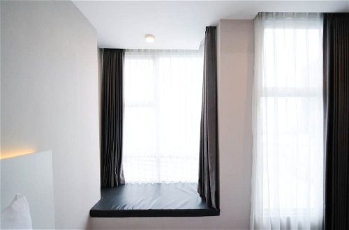 Foto 4 - Nice And Comfy Studio At Supermall Mansion Apartment