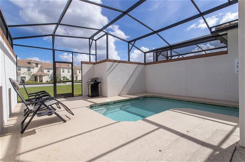 Photo 43 - Stunning Four Bedroom w Screened Pool Close to Disney 1559