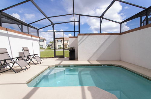 Photo 1 - Stunning Four Bedroom w Screened Pool Close to Disney 1559