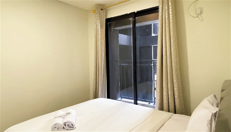 Photo 1 - Best Homey And Modern 2Br At Meikarta Apartment