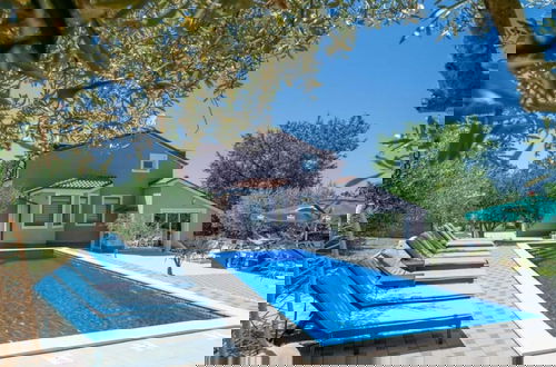 Foto 1 - Sunshine Comfortable Holiday Residence