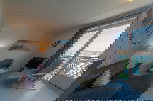 Foto 10 - Cozy Beach Side Apartment