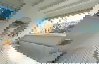 Foto 3 - Pleasant Holiday Home With Terrace