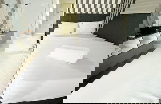Foto 3 - Homey And Cozy Living Studio Amartha View Apartment