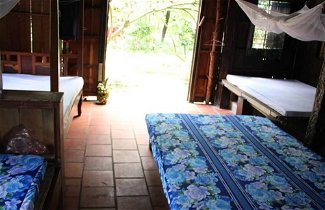 Photo 3 - Peaceful Homestay in the Middle of Fruit Garden - Room With Four Double Beds