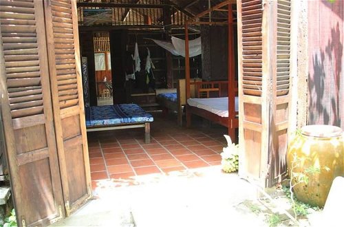 Photo 1 - Peaceful Homestay in the Middle of Fruit Garden - Room With Four Double Beds