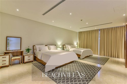 Foto 6 - Brand New Beachfront Villa In Five-star Resort