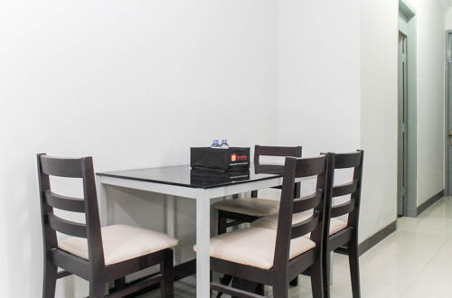 Photo 10 - Comfortable 2Br With Extra Room At Crown Court Executive Condominium