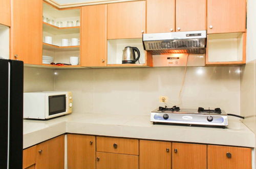 Photo 12 - Comfortable 2Br With Extra Room At Crown Court Executive Condominium