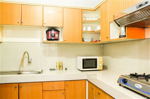 Photo 11 - Comfortable 2Br With Extra Room At Crown Court Executive Condominium