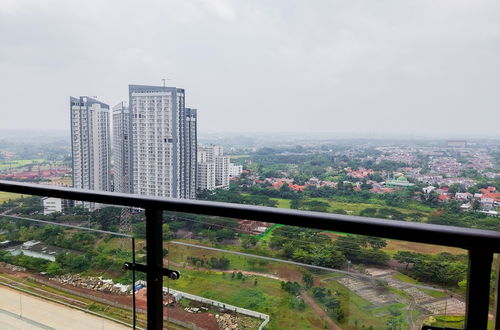 Photo 14 - Cozy And Nice Studio At Sky House Bsd Apartment