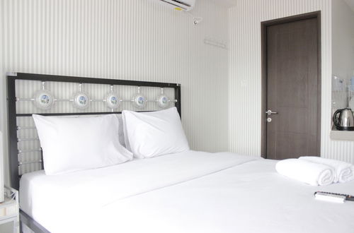 Photo 17 - Chic and Comfy Studio Room at Mekarwangi Square Apartment Cibaduyut